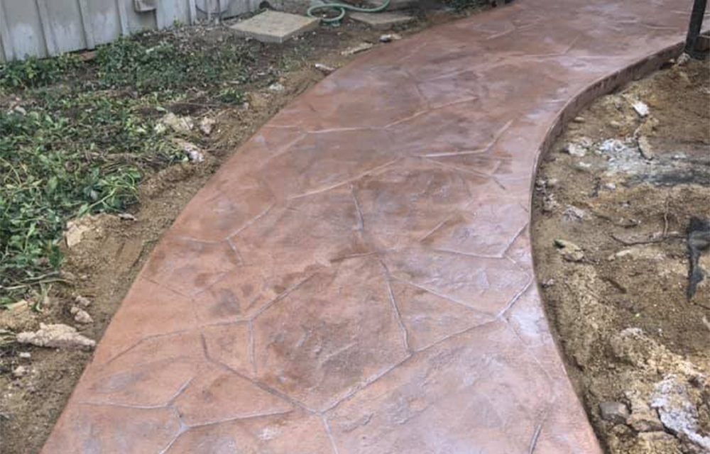 A decorative concrete walkway.