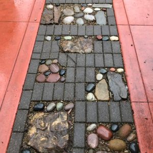 A decorative concrete walkway.