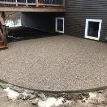 Exposed aggregate concrete patio.