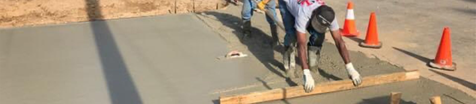 A lake house driveway under construction.