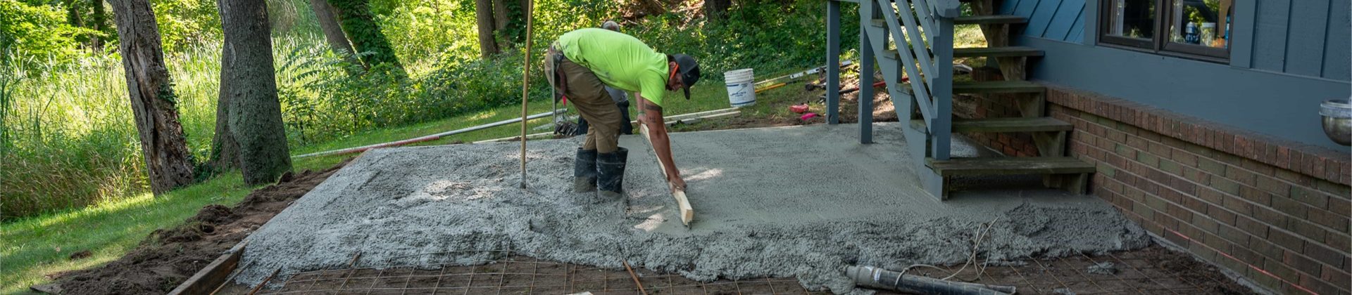 A concrete patio that is under construction.